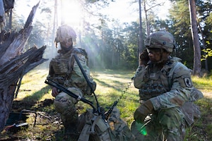 U.S. Soldiers assigned to the 173rd Mobile Brigade Combat Team, relay information through radio during exercise Saber Junction 26 at the Hohenfels Training Area, Joint Multinational Readiness Center (JMRC), Germany, Aug. 29, 2026. 7th Army Training Command provides a unique environment in Europe to develop leaders and formations who are prepared for large-scale combat operations, improving readiness. (U.S. Army Photo by SPC. Kaleb Lampkin)