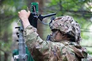 U.S. Army Pfc. Kristopher Pelroy, an air traffic control operator with 173rd Mobile Brigade Combat Team (Airborne), trains to counter unauthorized drones during exercise Saber Junction 26 at Joint Multinational Readiness Center's Hohenfels Training Area, Germany, Aug. 29, 2026. The ground control system utilized disables drones by jamming their navigation and control channels. During Saber Junction 26, the U.S. Army is implementing its Continuous Transformation initiative, utilizing new technologies and systems designed to enhance its warfighting readiness and ability to respond to crisis or conflict. (U.S. Army Photo by SGT Marc Morgenstern)