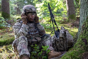 U.S. Army Pfc. Keon Brandford, an infantryman with 3rd Battalion, 504th Parachute Infantry Regiment, 173rd Mobile Brigade Combat Team (Airborne), coordinates with other units during an unmanned aircraft system operation as he participates in exercise Saber Junction 26 at Joint Multinational Readiness Center's Hohenfels Training Area, Germany, Aug. 29, 2026. JMRC's Combat Training Center rotations drive unrivaled innovation and readiness in the U.S. Army Europe and Africa area of operations. (U.S. Army photo by Sgt. David Little)