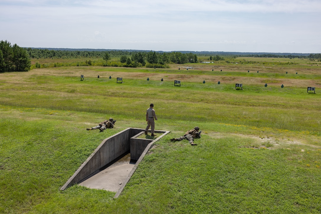 U.S. Marines and Sailors with 2nd Medical Battalion, 2nd Marine Logistics Group, fire at targets during a live-fire range at Marine Corps Base Camp Lejeune, North Carolina, August 26, 2026. The battalion conducted a familiarization range to complete pre-deployment training requirements. (U.S. Marine Corps photo by Sgt. Rafael Brambila-Pelayo)