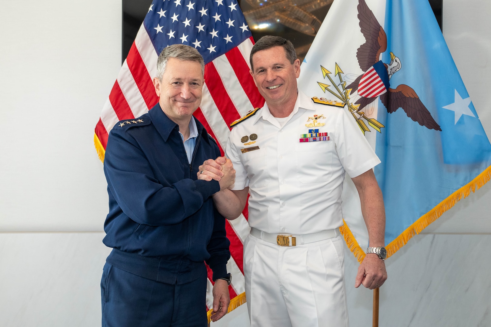 Chairman of the Joint Chief of Staff, Gen. Dan Caine, and Chief of the Australian Defence Force, Adm. Mark Hammond pose for a photo prior to a bilateral meeting during the Indo-Pacific Chiefs of Defense conference in Victoria, Canada, Aug. 31, 2026. (DoW photo by Mass Communication Specialist 1st Class Naomi Johnson)