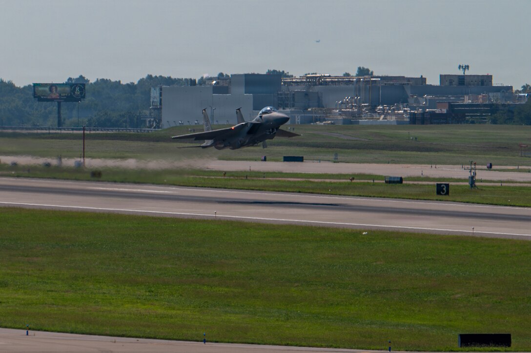 a jet aircraft takes off from a runway