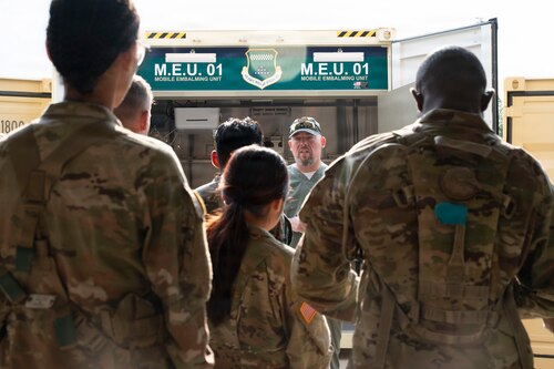 Matthew Metschke, Air Force Mortuary Affairs Operations, Mortuary Affairs Division deputy chief, delivers a brief on the Mobile Embalming Unit (MEU-1) to a group of Exercise Northern Strike 26-2 participants at Grayling Army Airfield, Michigan, Aug. 9, 2026.
