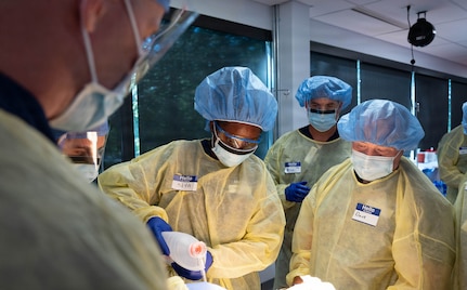 U.S. Army Pfc. Nkogun Nya Silnodad, a combat medic assigned to the Massachusetts Army National Guard Medical Detachment, performs manual breathing support for an intubated patient at the Bioskills Lab in Lexington, Massachusetts, Aug. 19, 2026.