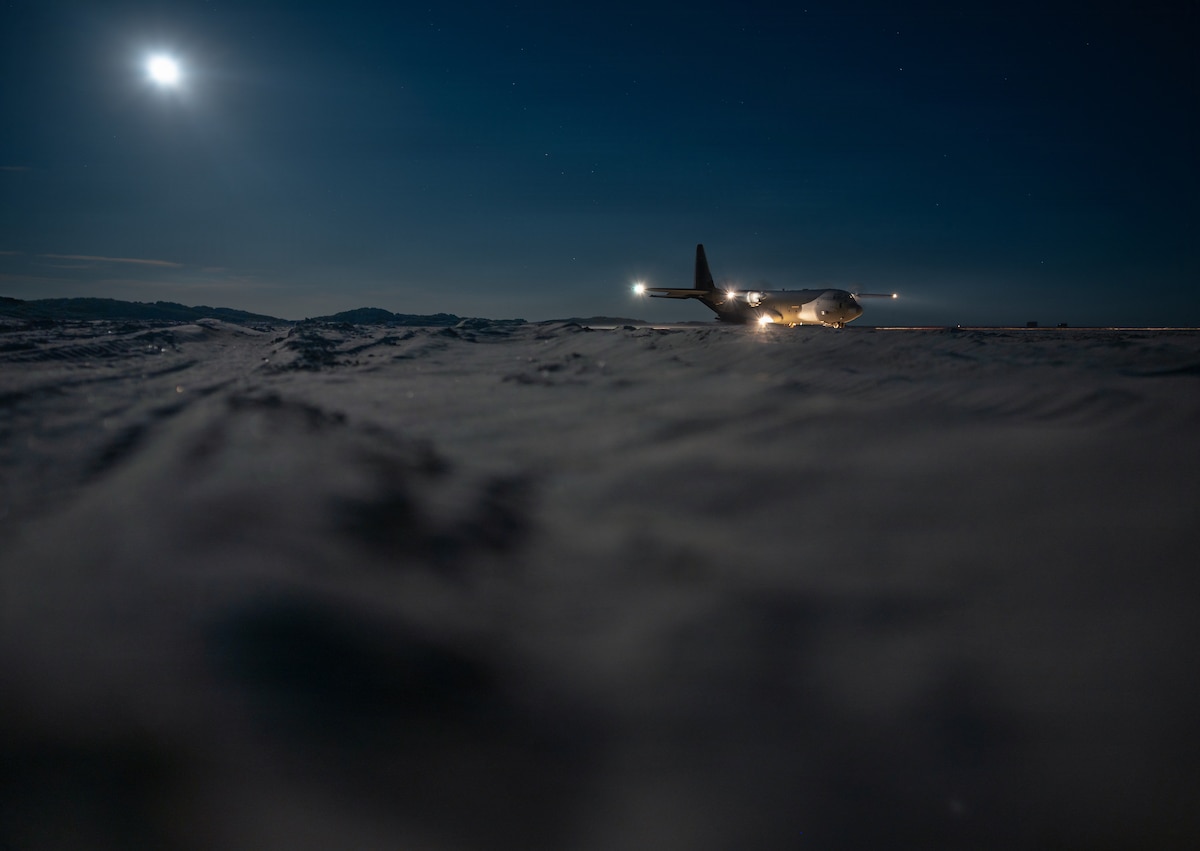 A U.S. Air Force C-130J Super Hercules aircraft assigned to the 37th Airlift Squadron operates on a sand landing zone in Rømø, Denmark, during exercise Northern Viking