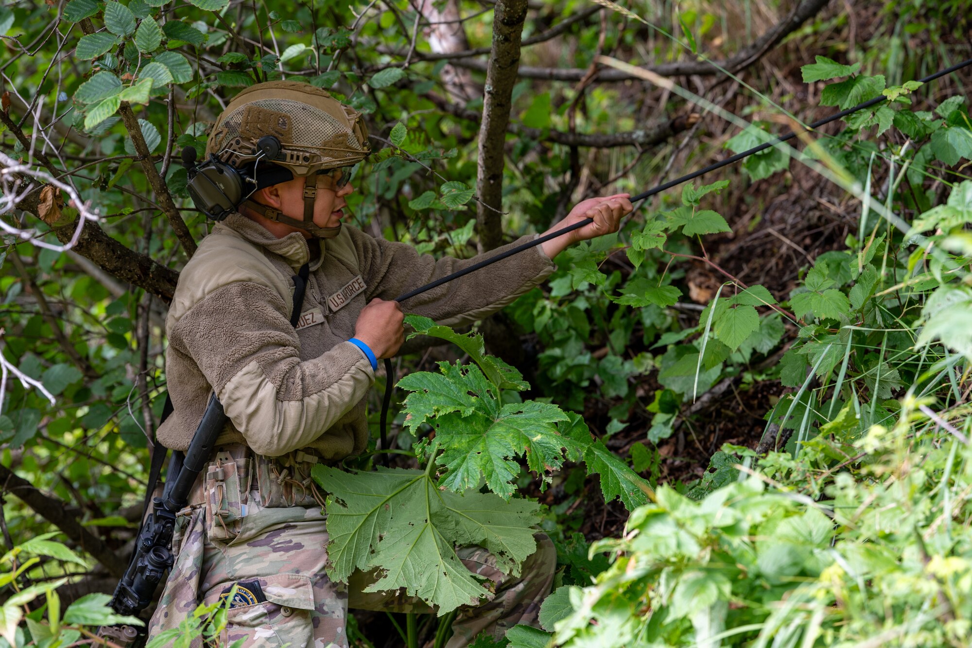 U.S. Air Force Airman 1st Class Alexis Rodriguez, a member of the 673d Security Forces Squadron Alaska Defense Sustainment Training cadre, demonstrates hill ascension techniques during ADST at Joint Base Elmendorf-Richardson, Alaska, Aug. 31, 2026.