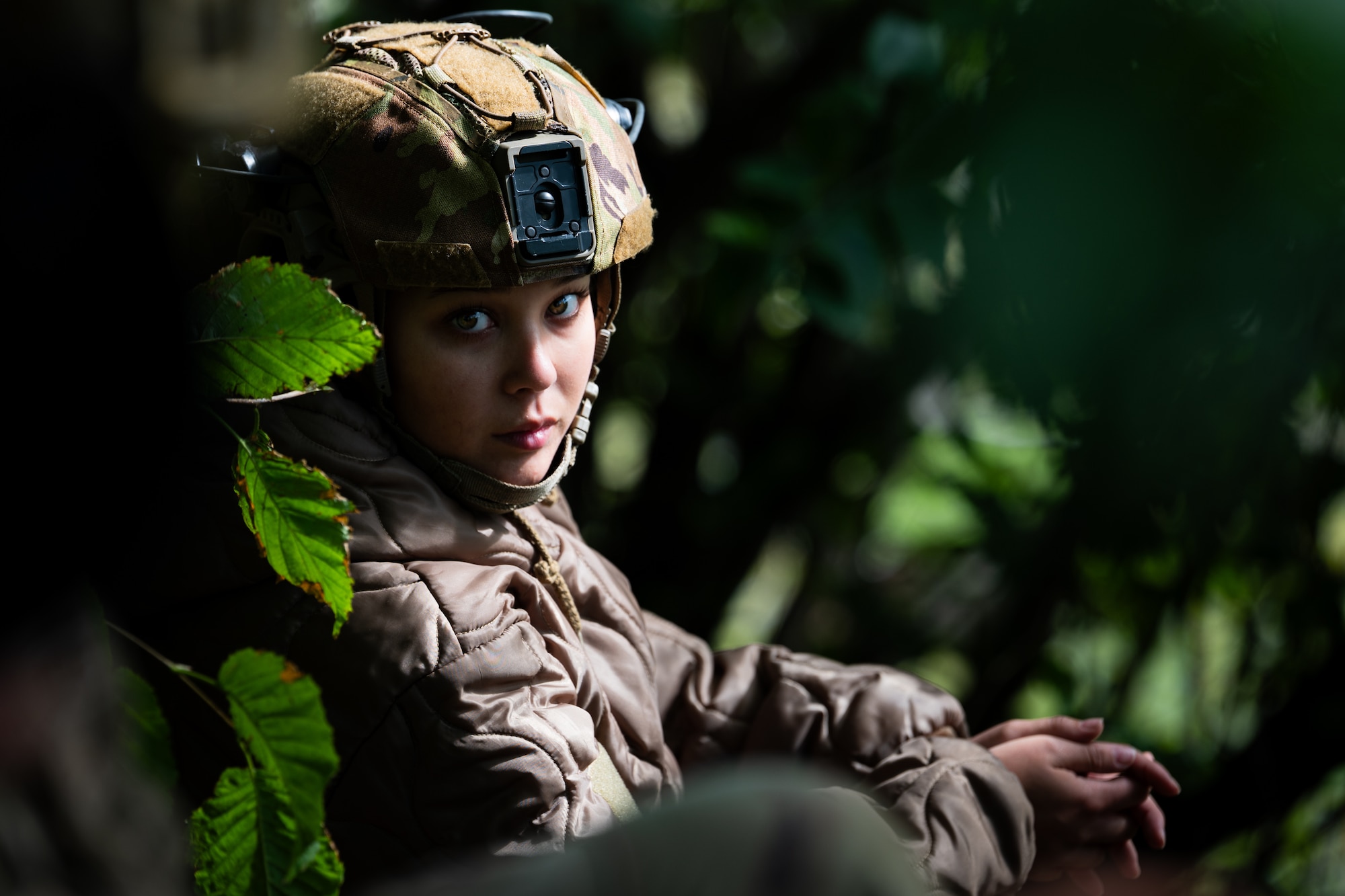 U.S. Alaska Air National Guard Airman 1st Class Thresa Savo, 176th Security Forces Squadron defender and Alaska Defense Sustainment Training cadre, observes a rope-tying demonstration at Joint Base Elmendorf-Richardson, Alaska, Aug. 31, 2026.