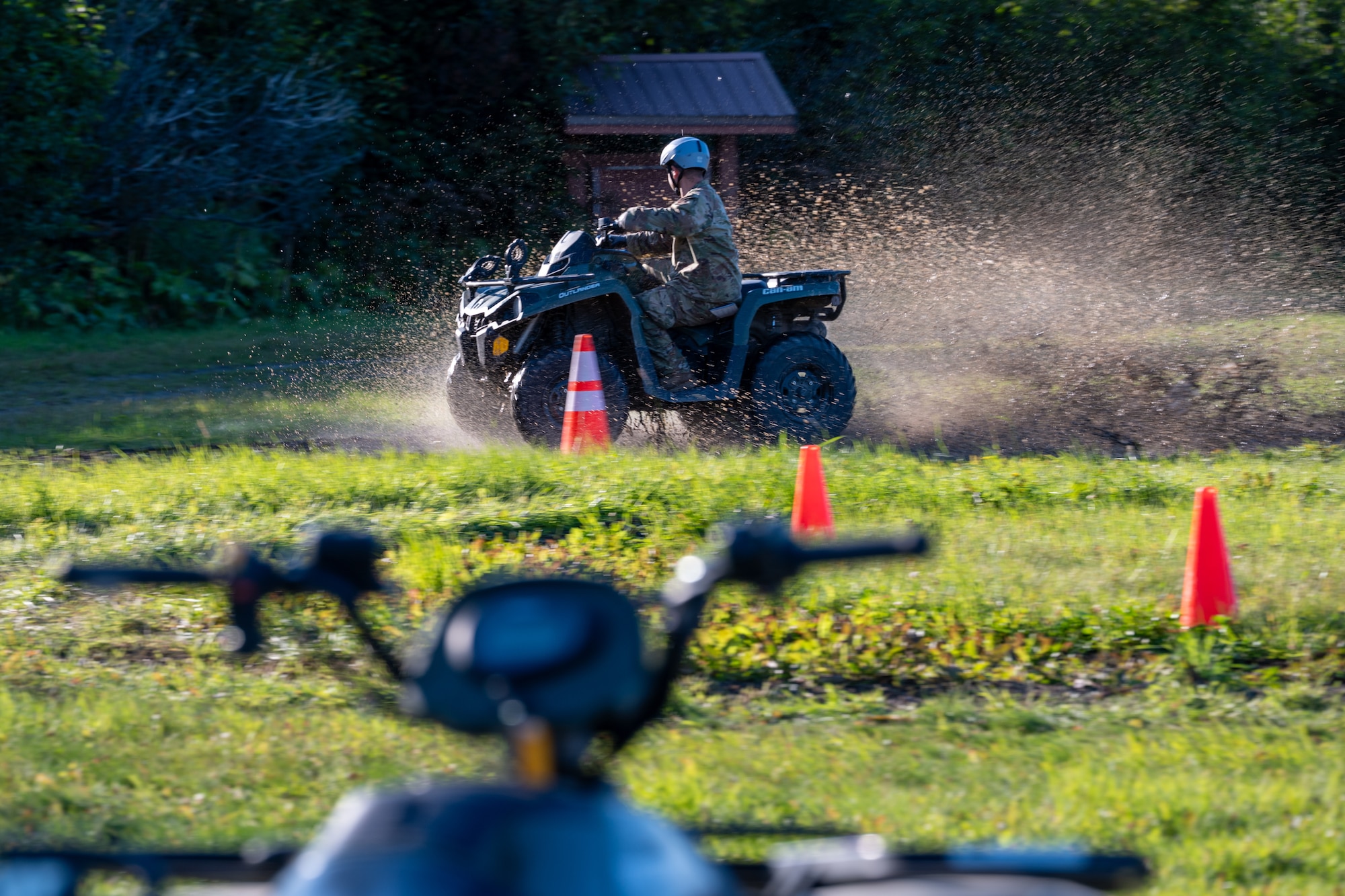 U.S. Air Force Staff Sgt. Nevin Larock, an instructor with the 673d Security Forces Squadron, operates an all-terrain vehicle during Alaska Defense Sustainment Training at Joint Base Elmendorf-Richardson, Alaska, Aug. 31, 2026.
