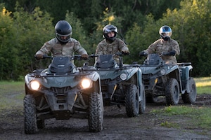 From left, U.S. Air Force Airman 1st Class Adam Fernandez, Airman Levi Ruyle, and Staff Sgt. Ethan Farmer, 673d Security Forces Squadron defenders, ride all-terrain vehicles during Alaska Defense Sustainment Training at Joint Base Elmendorf-Richardson, Alaska, Aug. 31, 2026.