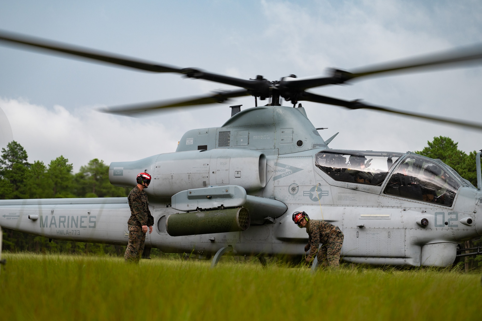 U.S. Marines assigned to Marine Light Attack Helicopter Squadron (HMLA) 773 prepare an AH-1Z Viper helicopter assigned to HMLA-773 during a forward arming and refueling point exercise at Joint Base McGuire-Dix-Lakehurst, N.J., Aug. 27, 2026. FARP’s are a temporary mobile facility deployed close to an area of operations to refuel and rearm aircraft in austere locations, maximizing combat operational reach and reducing turnaround time. (U.S. Air Force photo by Airman 1st Class Haeleigh Bayle)