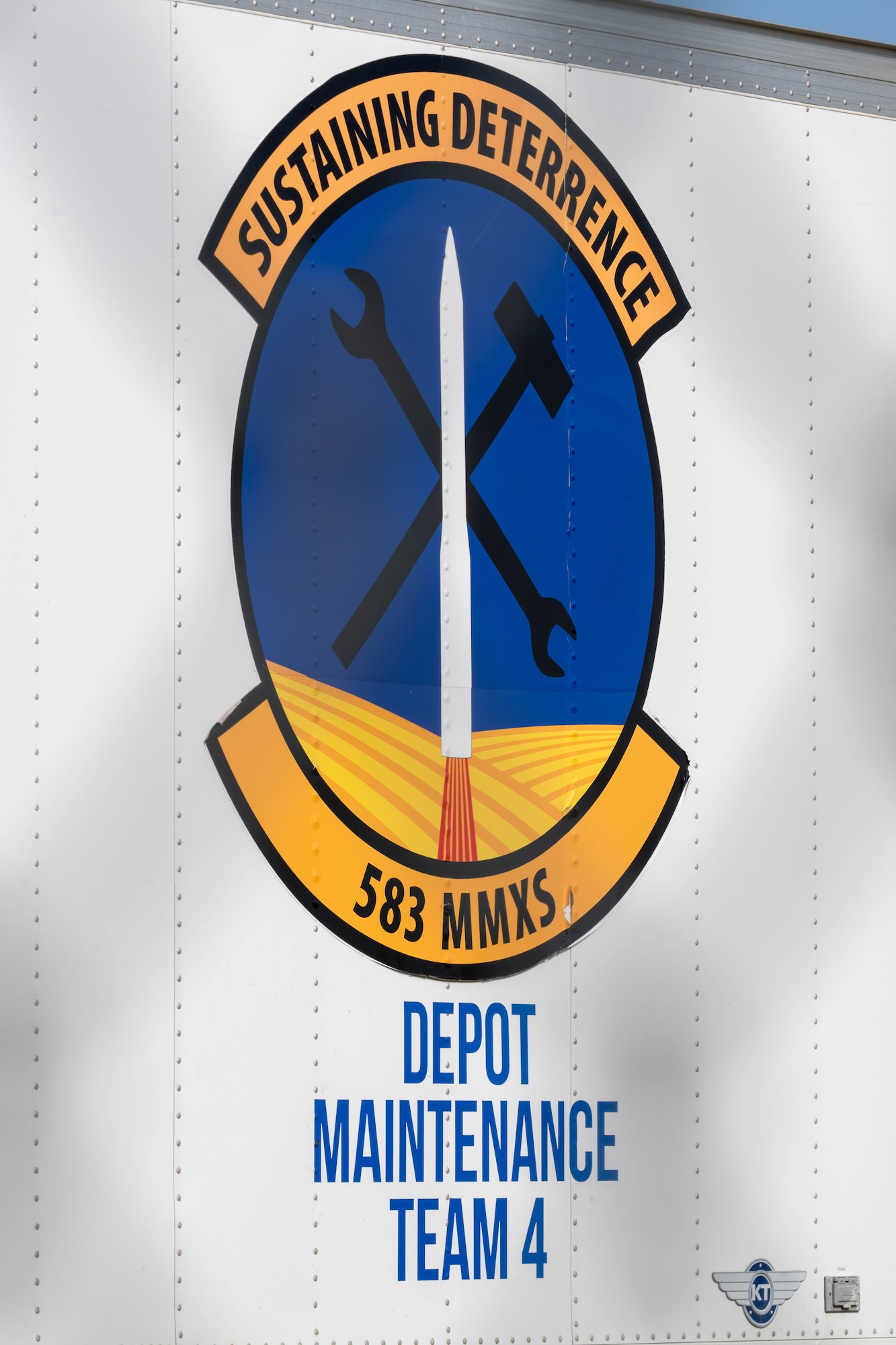 The seal of the 583rd Missile Maintenance Squadron is displayed on the side of a trailer at a launch facility near Minot Air Force Base, North Dakota, Aug. 18, 2026.