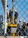 Missile maintenance technicians with the 583rd Missile Maintenance Squadron prepare to lower into a silo at a launch facility near Minot Air Force Base, North Dakota, Aug. 18, 2026.