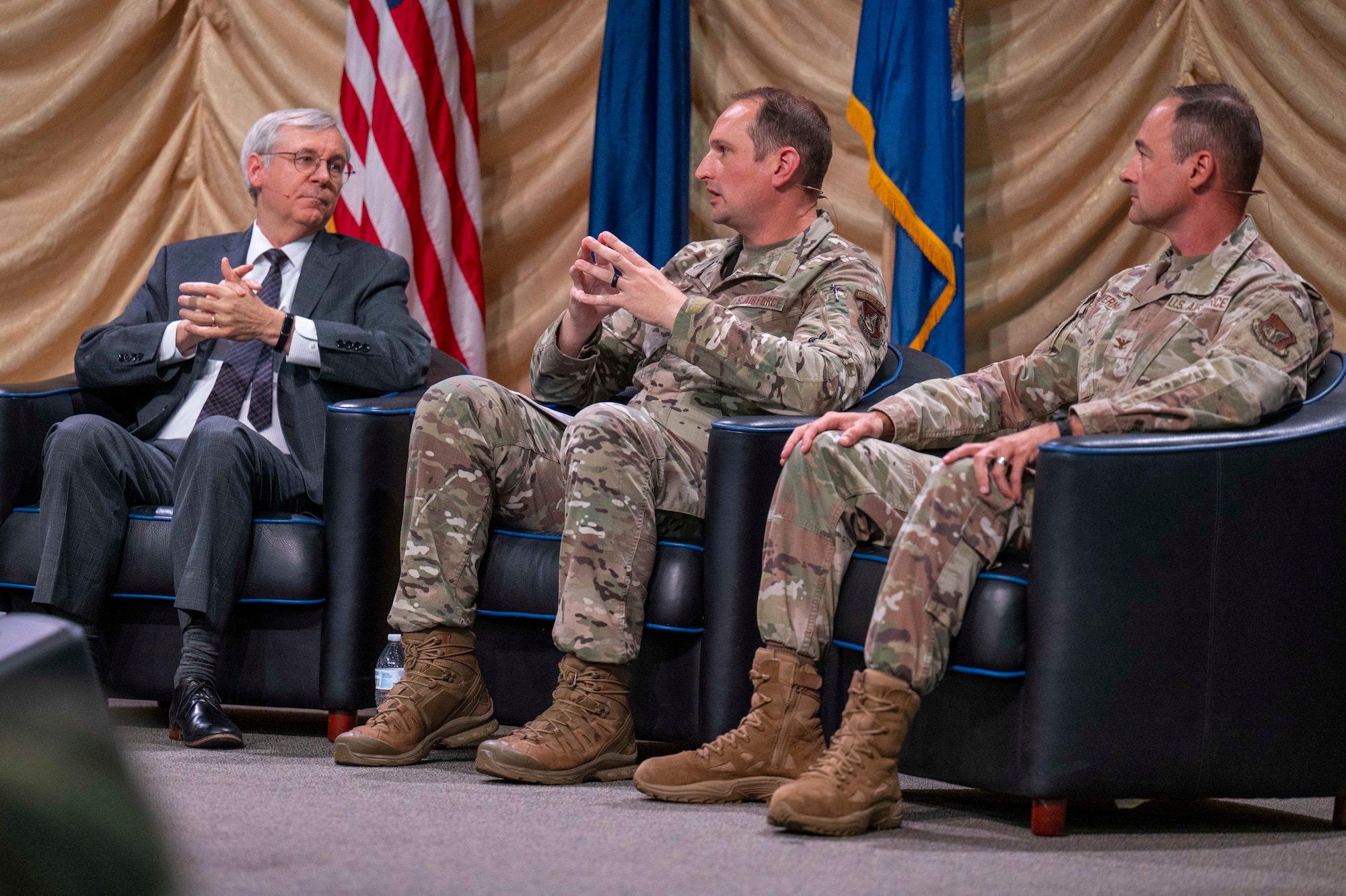 U.S. Air Force Col. Matthew Johnston, 354th Fighter Wing commander, center, speaks on community integration during a panel at the 2026 Alaska Defense Forum in Fairbanks, Alaska, Aug. 26, 2026.