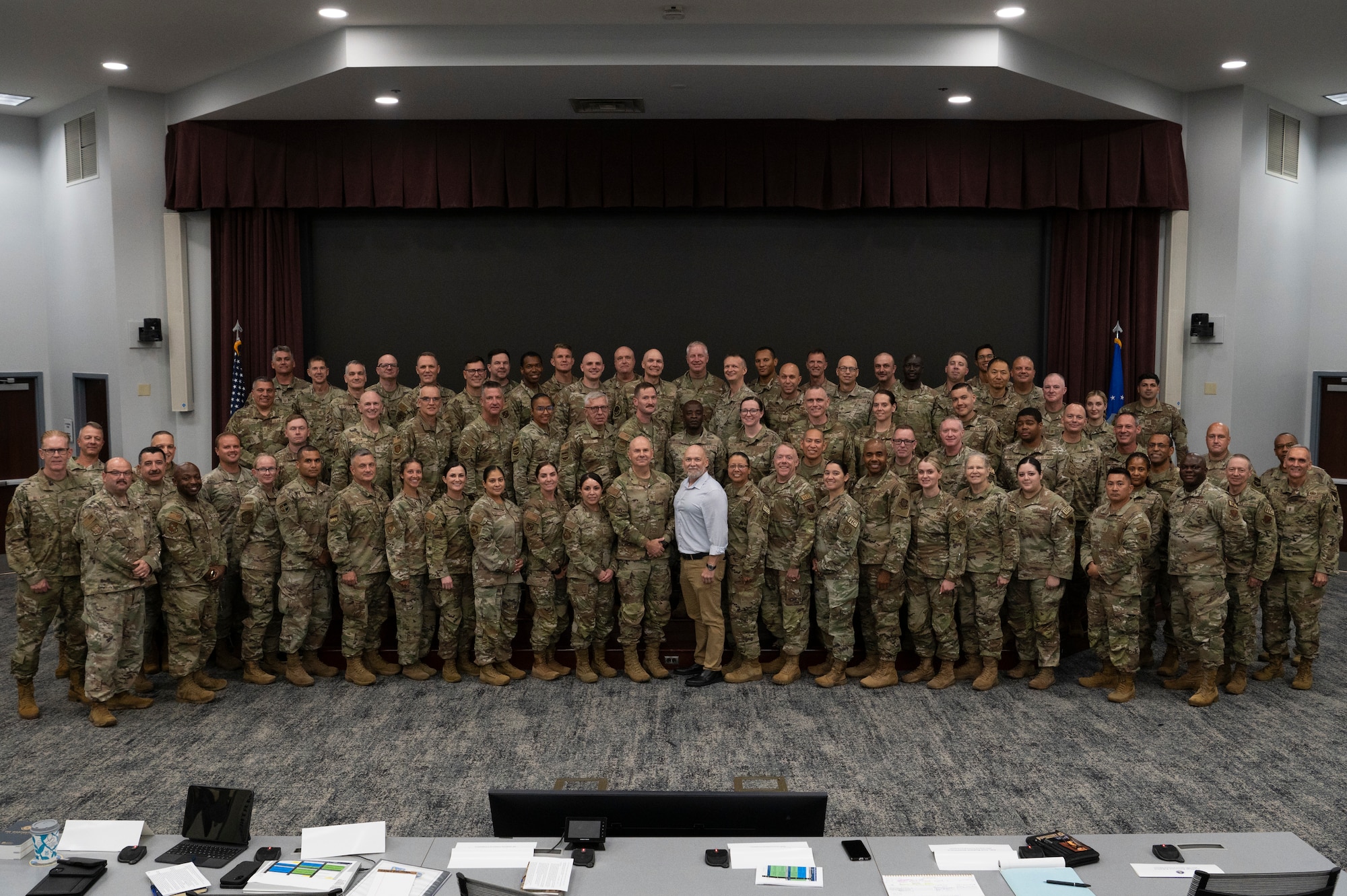 Airmen stand for a photo