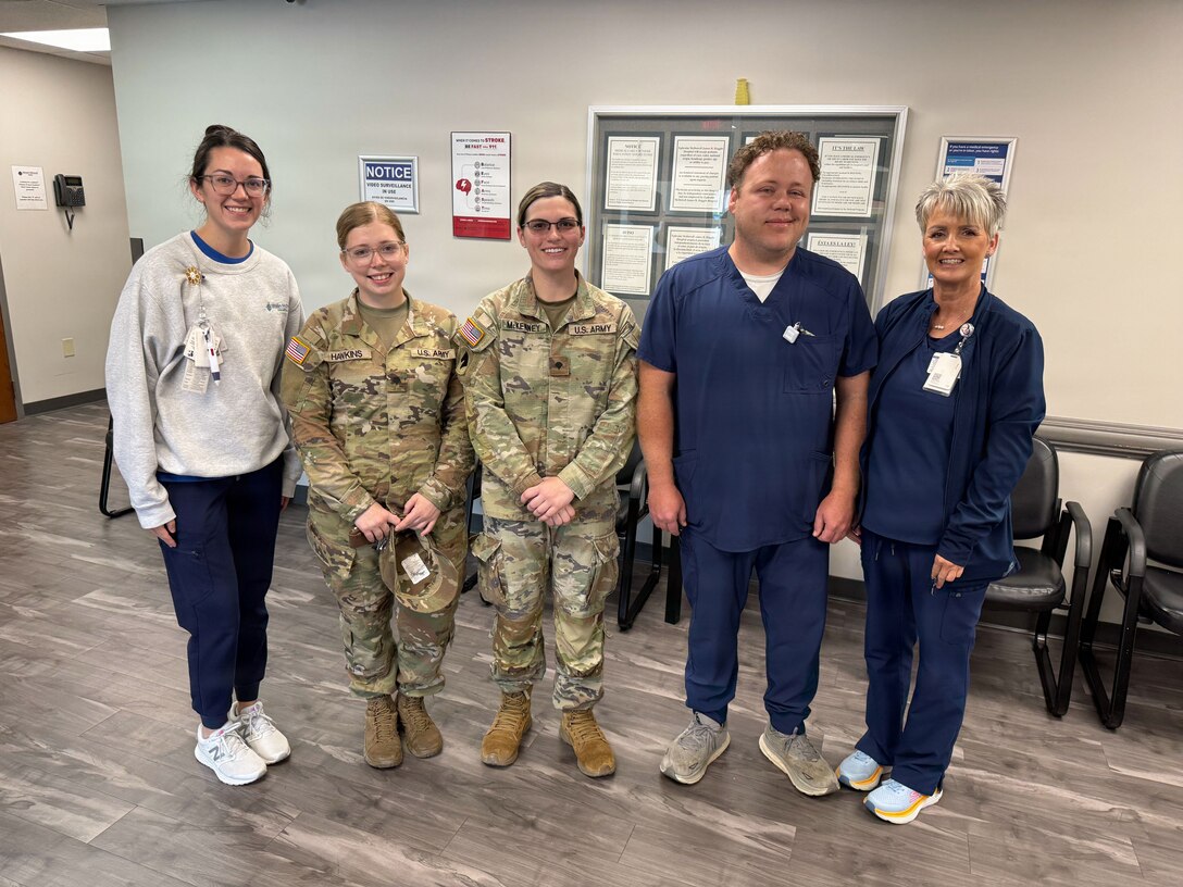 Kentucky Army National Guard Soldiers assigned to the 103rd Brigade Support Battalion distributed leftover flowers and pastries to local healthcare workers and nursing home residents Aug. 9 in Harrodsburg, Kentucky, following a change of command ceremony.