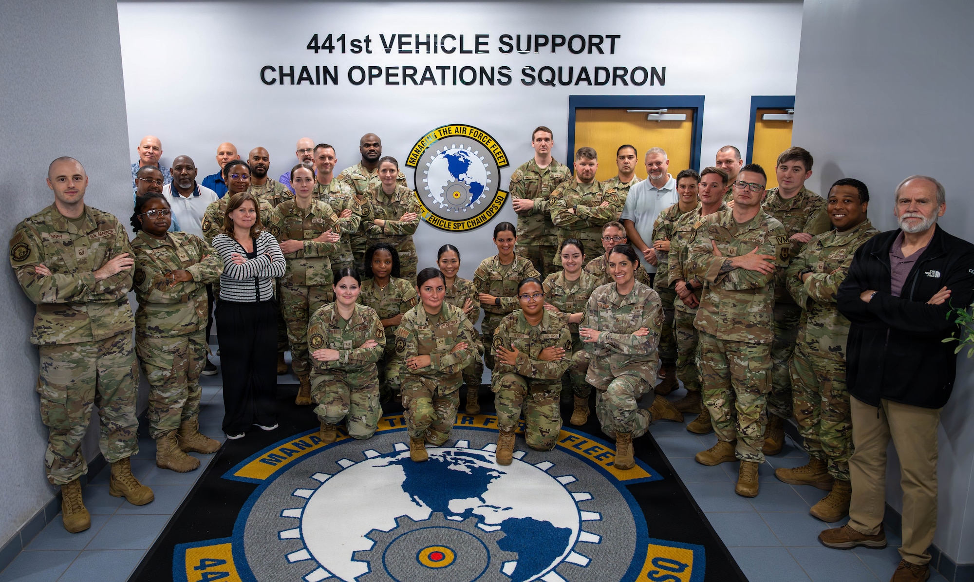 Airmen pose for a photo. (U.S. Air Force photo by Airman 1st Class Chloe Goodman)