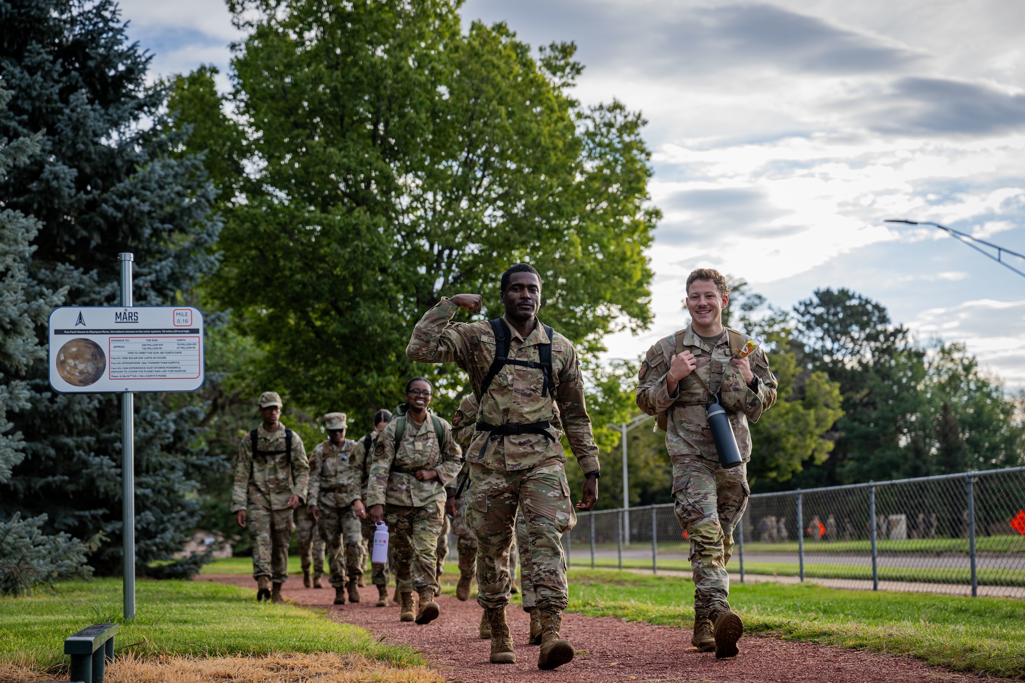 Military members complete a ruck march on Peterson Space Force Base.
