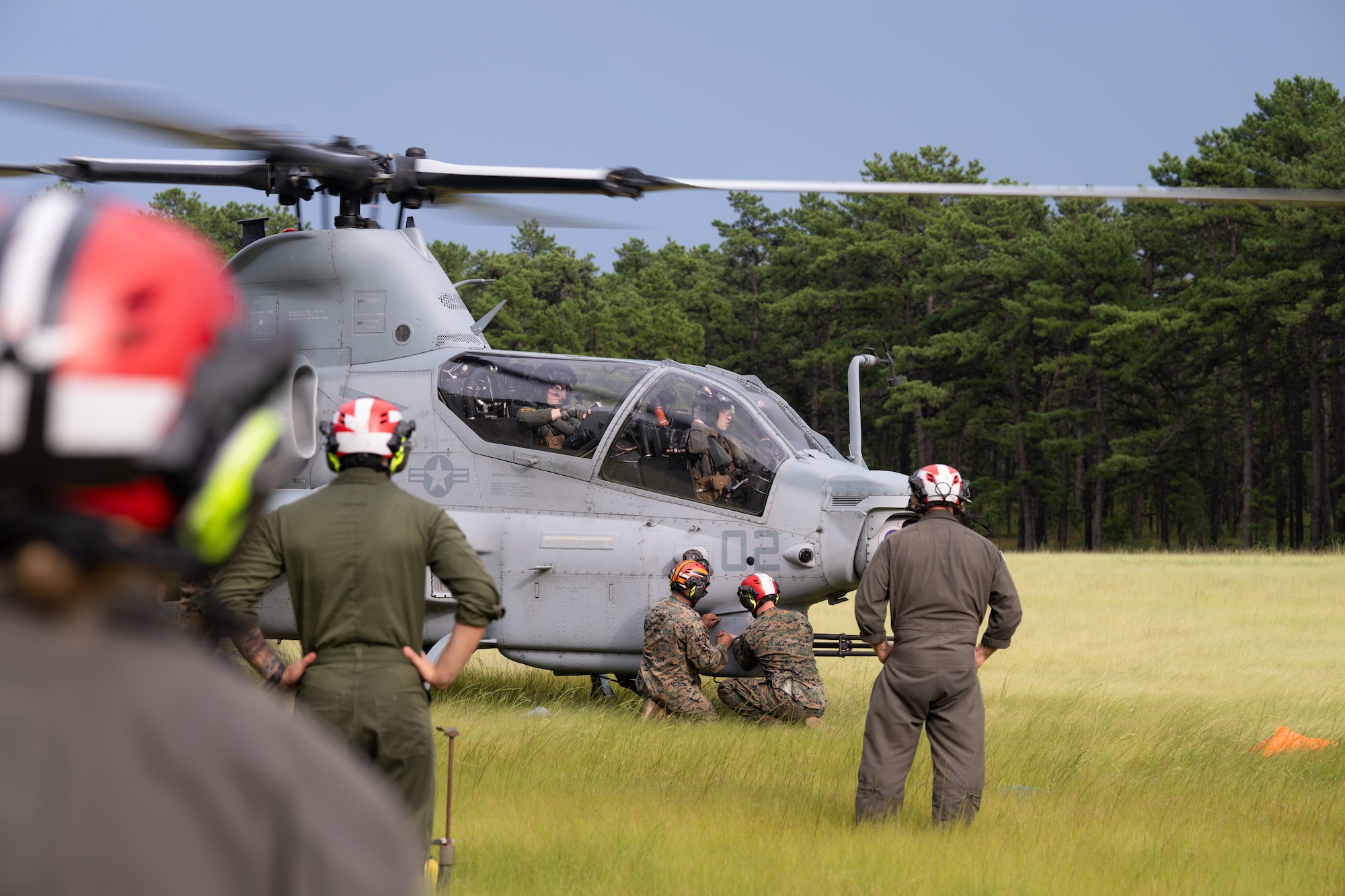 U.S. Marines assigned to Marine Light Attack Helicopter Squadron (HMLA) 773 and Marine Aviation and Logistics Squadron (MALS) 49 arm an AH-1Z Viper helicopter during a forward arming and refueling point exercise at Joint Base McGuire-Dix-Lakehurst, N.J., Aug. 27, 2026.