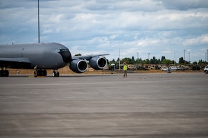 A U.S. Airman assigned to the 92nd Aircraft Maintenance Squadron, martials a KC-135 Stratotanker during exercise Titan Fury 26-6 at Fairchild Air Force Base, Washington, Sept. 2, 2026.