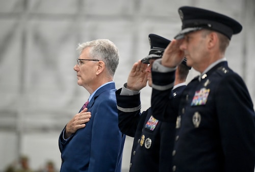 Secretary of the Air Force Troy Meink places his hand over his heart as the National Anthem is played at the Chief of Space Operations Change of Responsibility ceremony, Joint Base Andrews Md., Sept 3, 2026. During the ceremony, Gen. Douglas Schiess was appointed the new Chief of Space Operations. (U.S. Air Force photo by Andy Morataya)
