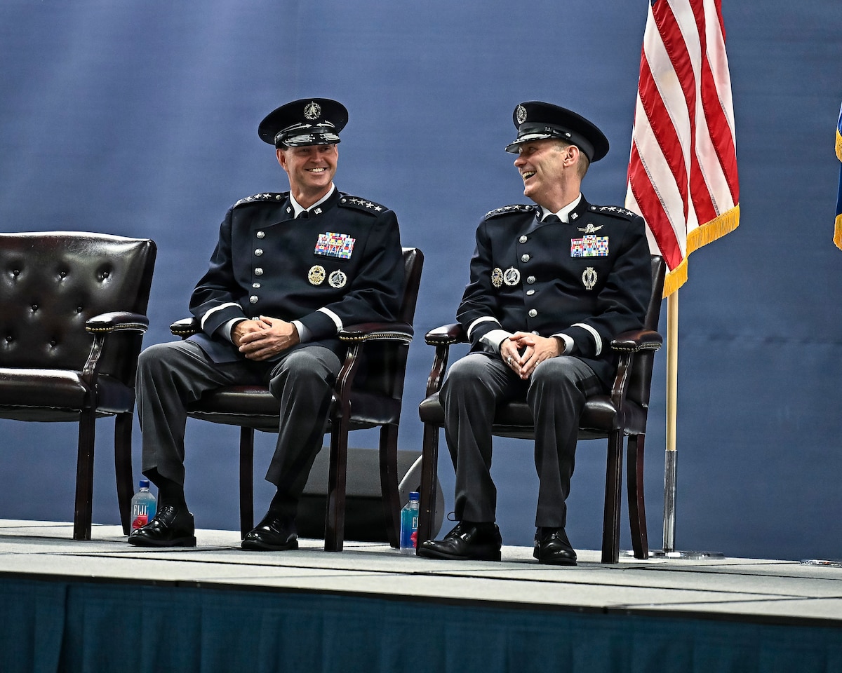 Chief of Space Operations Gen. Chance Saltzman, left, and Gen. Douglas Schiess laugh during a change of responsibility ceremony on Joint Base Andrews, Md., Sept. 3, 2026. Schiess succeeded Saltzman as the third CSO of the U.S. Space Force. (U.S. Air Force photo by Eric Dietrich)