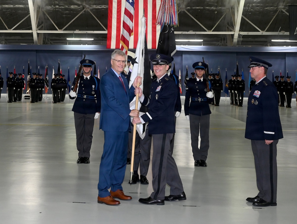 Secretary of the Air Force Troy Meink presents the ceremonial office flag to newly appointed Chief of Space Operations Gen. Douglas Schiess during a Change of Responsibility ceremony, Joint Base Andrews Md., Sept 3, 2026. (U.S. Air Force photo by Andy Morataya)