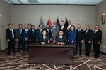 A group of people pose for a photo