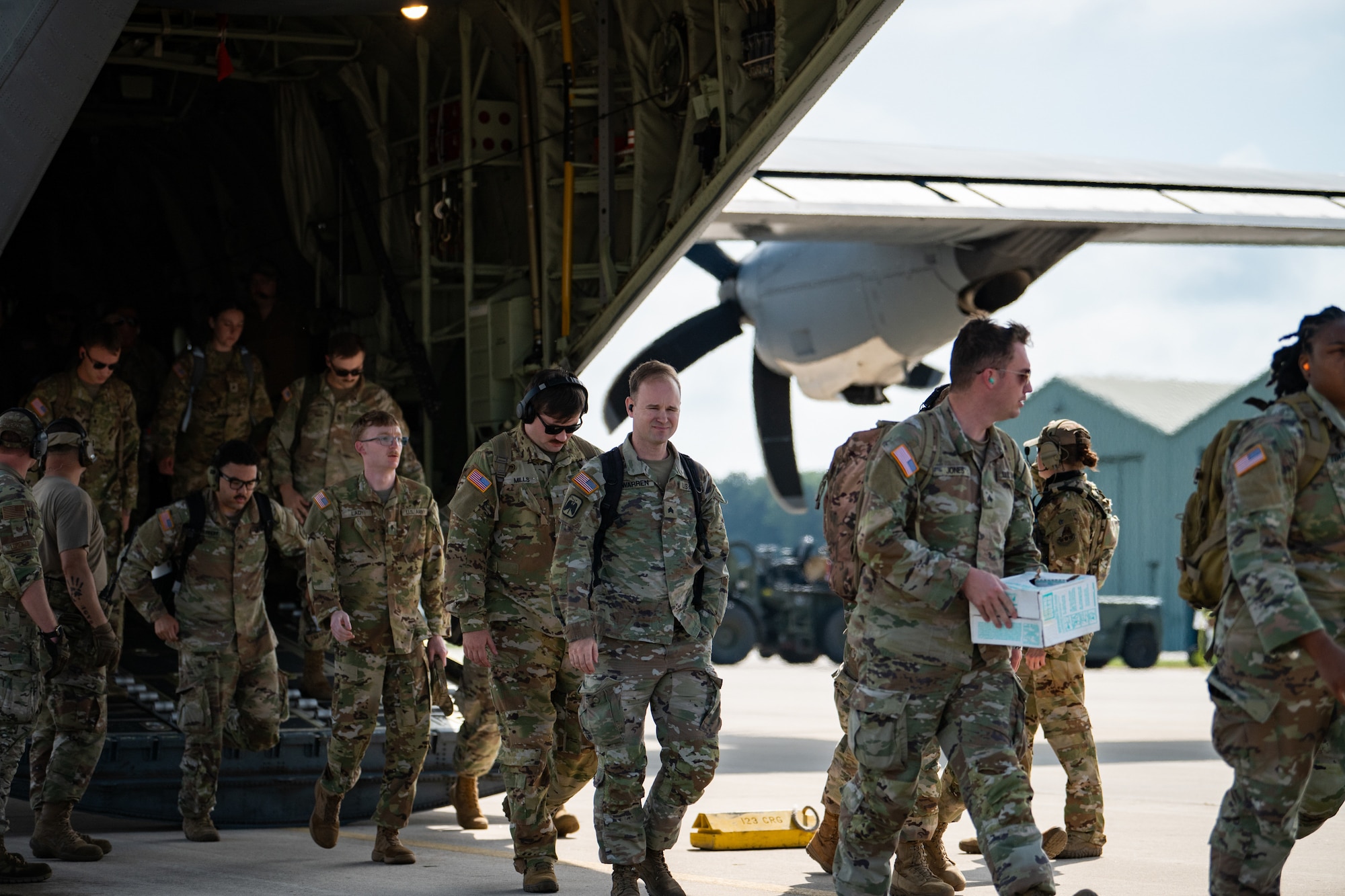 U.S. Army Soldiers with the Kentucky Army National Guard exit a C-130J Super Hercules from the Kentucky Air National Guard’s 123rd Airlift Wing at Volk Field Combat Readiness Training Center, Wis., Aug. 21, 2026, during Exercise Patriot 26. The Air National Guard-hosted exercise brings together approximately 1,000 Airmen and Soldiers from National Guard units across 35 states, along with federal, state and local agencies, to enhance domestic response readiness and interagency coordination during large-scale emergencies. (U.S. Air National Guard photo by Senior Airman Angelee Barnett)