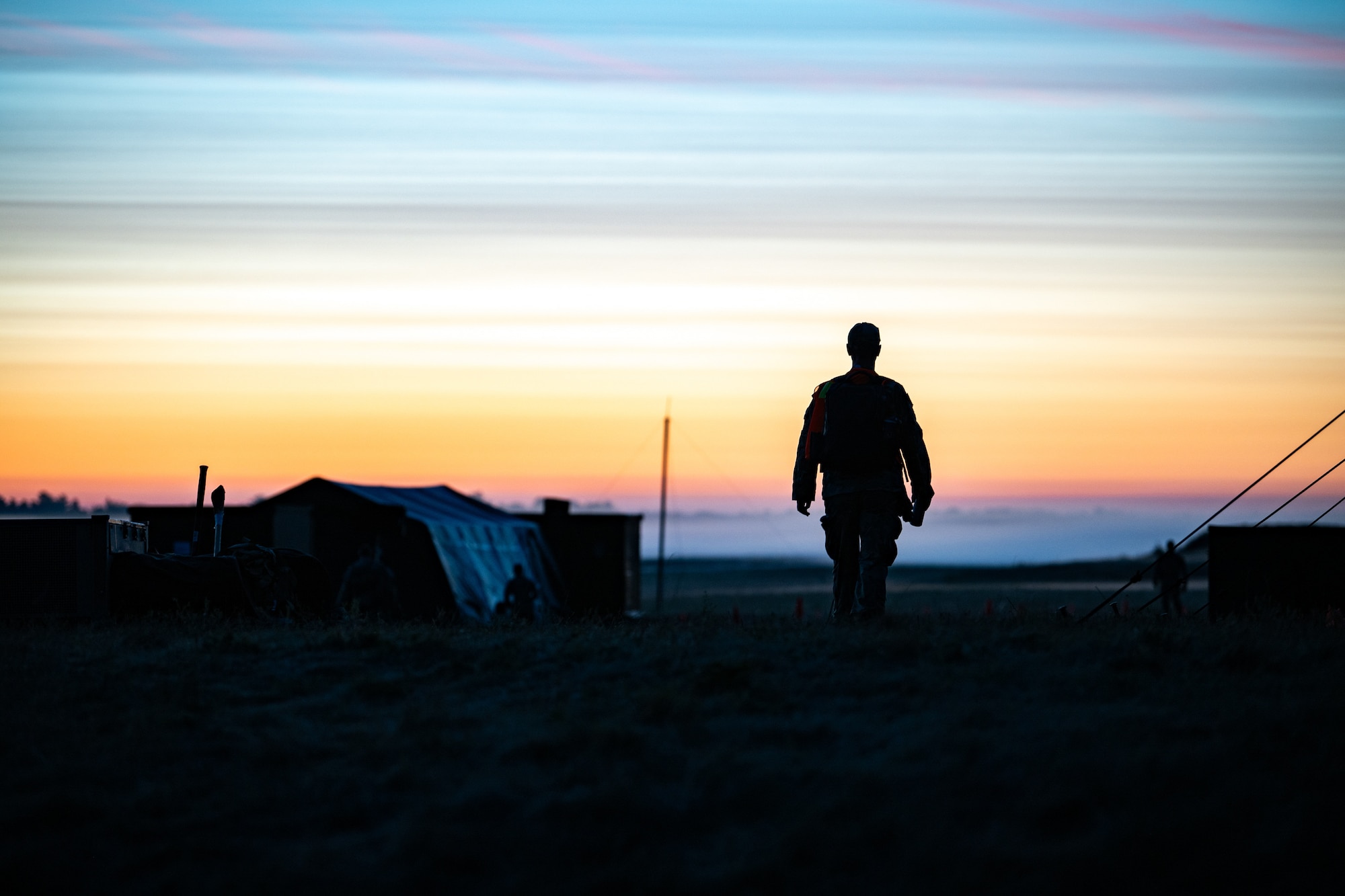A U.S. Air Force Airman from the Kentucky Air National Guard’s 123rd Contingency Response Group prepares for the work day at Volk Field Combat Readiness Training Center, Wis., Aug. 24, 2026, during exercise Patriot 26. The Air National Guard-hosted exercise brings together approximately 1,000 Airmen and Soldiers from National Guard units across 35 states, along with federal, state and local agencies, to enhance domestic response readiness and interagency coordination during large-scale emergencies. (U.S. Air National Guard photo by Senior Airman Angelee Barnett)