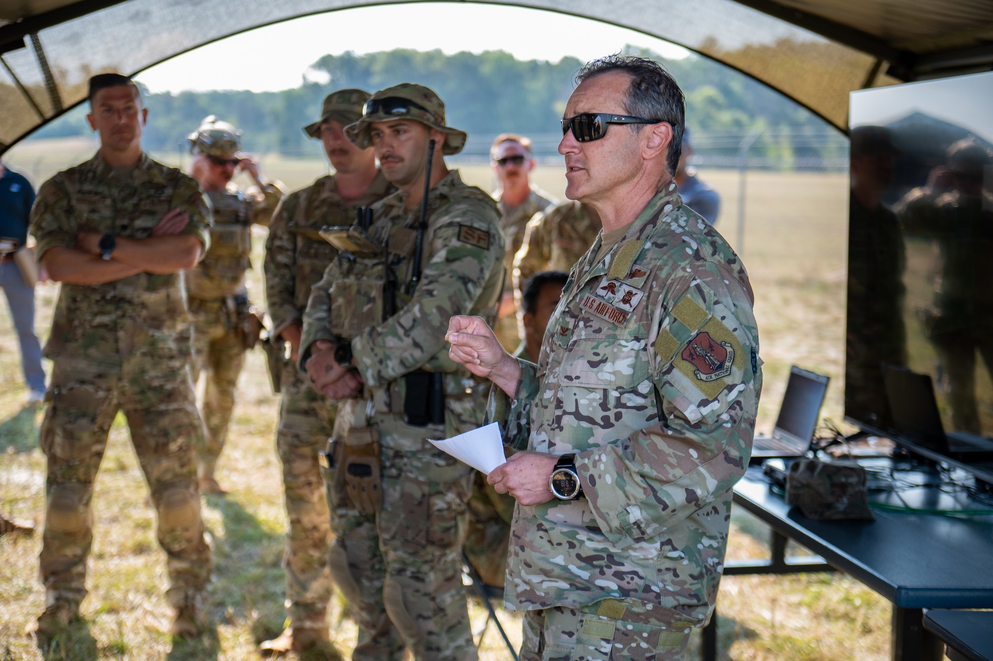 U.S. Air Force Col. Aaron Zamora, right, commander of the Kentucky Air National Guard’s 123rd Contingency Response Group, speaks with National Guard senior leadership at Volk Field Combat Readiness Training Center, Wis., Aug. 24, 2026, during exercise Patriot 26. The Air National Guard-hosted exercise brings together approximately 1,000 Airmen and Soldiers from National Guard units across 35 states, along with federal, state and local agencies, to enhance domestic response readiness and interagency coordination during large-scale emergencies. (U.S. Air National Guard photo by Senior Airman Angelee Barnett)