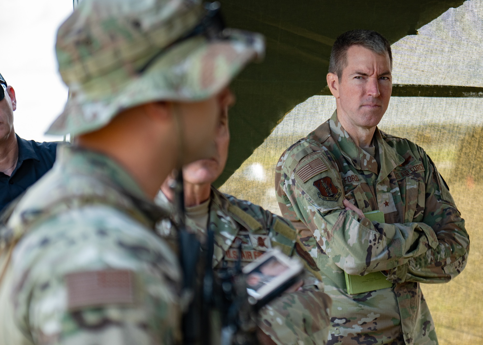 U.S. Air Force Brig. Gen. Jeremy R. Ford, director of Air National Guard Operations at Joint Base Andrews, Md., attends an air defense system briefing by Airmen from the Kentucky Air National Guard’s 123rd Contingency Response Group at Volk Field Combat Readiness Training Center, Wis., Aug. 24, 2026, during exercise Patriot 26. The Air National Guard-hosted exercise brings together approximately 1,000 Airmen and Soldiers from National Guard units across 35 states, along with federal, state and local agencies, to enhance domestic response readiness and interagency coordination during large-scale emergencies. (U.S. Air National Guard photo by Senior Airman Angelee Barnett)