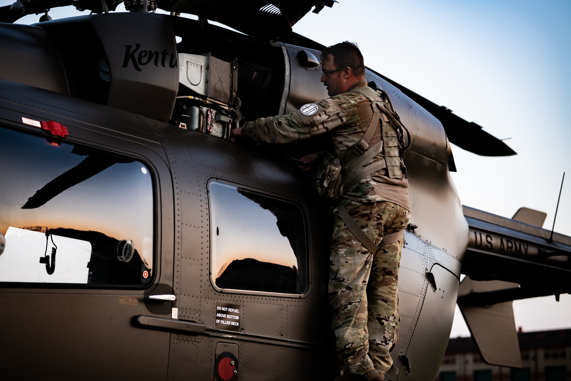 U.S. Army Sgt.1st Class Devin Gregory from the Kentucky Army National Guard’s Charlie Company, 1st Battalion, 376th Aviation Regiment, inspects a UH-72 Lakota prior to a night sortie at Volk Field Combat Readiness Training Center, Wis., Aug. 22, 2026, during exercise Patriot 26. The Air National Guard-hosted exercise brings together approximately 1,000 Airmen and Soldiers from National Guard units across 35 states, along with federal, state and local agencies, to enhance domestic response readiness and interagency coordination during large-scale emergencies. (U.S. Air National Guard photo by Senior Airman Angelee Barnett)