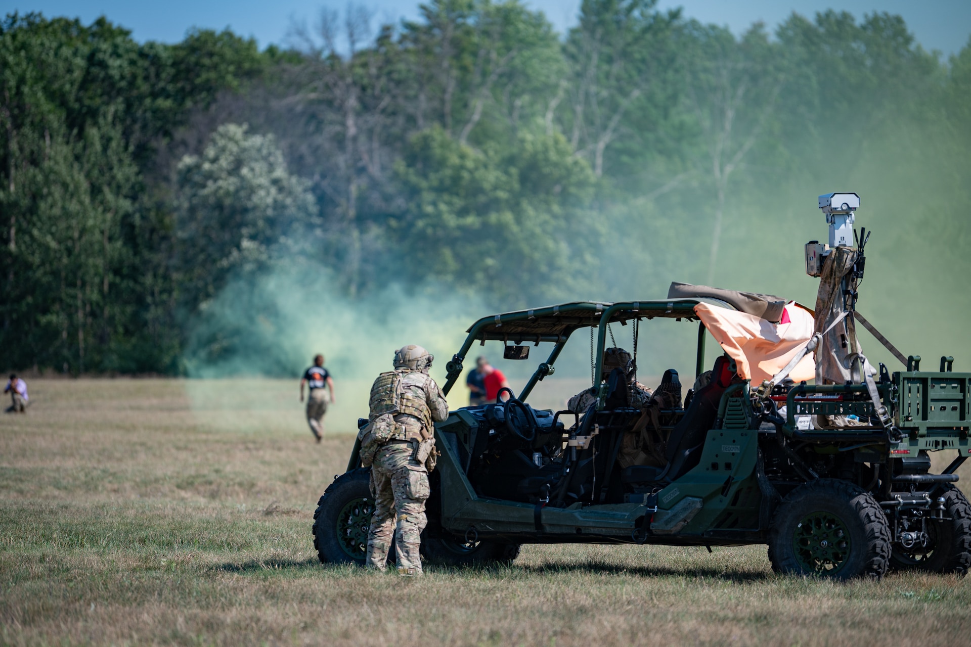 U.S. Air Force Security Forces specialists with the Kentucky Air National Guard’s 123rd Contingency Response Group fire blank ammunition at simulated opposing forces at Volk Field Combat Readiness Training Center, Wis., Aug. 26, 2026, during exercise Patriot 26. The Air National Guard-hosted exercise brings together approximately 1,000 Airmen and Soldiers from National Guard units across 35 states, along with federal, state and local agencies, to enhance domestic response readiness and interagency coordination during large-scale emergencies. (U.S. Air National Guard photo by Senior Airman Angelee Barnett)