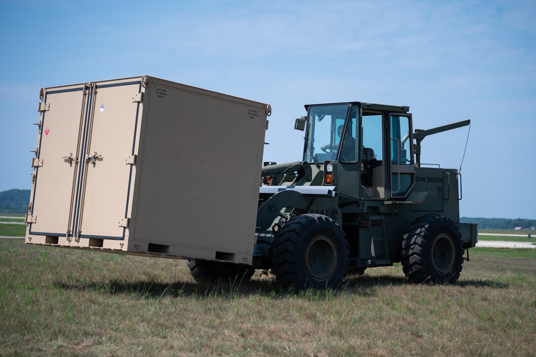 U.S. Air Force Senior Airman Everett Hanley, an air transportation specialist with the Kentucky Air National Guard’s 123rd Contingency Response Group, operates a forklift during exercise Patriot 2026 at Volk Field Combat Readiness Training Center, Wis., Aug. 20, 2026. Patriot 26, an Air National Guard-hosted exercise brings together approximately 1,000 Airmen and Soldiers from National Guard units across 35 states, along with federal, state and local agencies, to enhance domestic response readiness and interagency coordination during large-scale emergencies. (U.S. Air National Guard photo by Senior Airman Angelee Barnett)