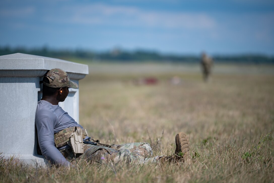 U.S. Air Force Staff Sgt. Xavier Wilson, an air transportation specialist for the Kentucky Air National Guard’s 123rd Contingency Response Group, plays an opposing force at Volk Field Combat Readiness Training Center, Wis., Aug. 26, 2026, during exercise Patriot 26.The Air National Guard-hosted exercise brings together approximately 1,000 Airmen and Soldiers from National Guard units across 35 states, along with federal, state and local agencies, to enhance domestic response readiness and interagency coordination during large-scale emergencies. (U.S. Air National Guard photo by Senior Airman Angelee Barnett)