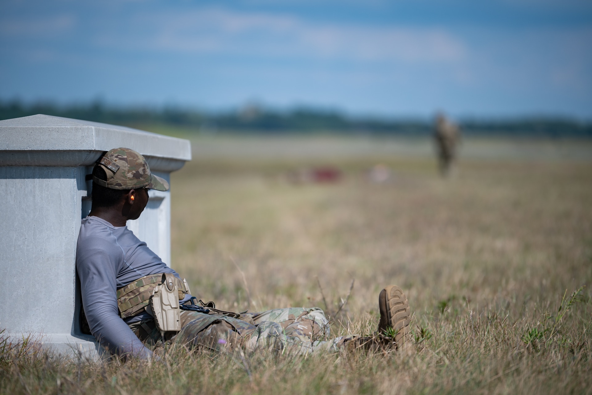 U.S. Air Force Staff Sgt. Xavier Wilson, an air transportation specialist for the Kentucky Air National Guard’s 123rd Contingency Response Group, plays an opposing force at Volk Field Combat Readiness Training Center, Wis., Aug. 26, 2026, during exercise Patriot 26.The Air National Guard-hosted exercise brings together approximately 1,000 Airmen and Soldiers from National Guard units across 35 states, along with federal, state and local agencies, to enhance domestic response readiness and interagency coordination during large-scale emergencies. (U.S. Air National Guard photo by Senior Airman Angelee Barnett)