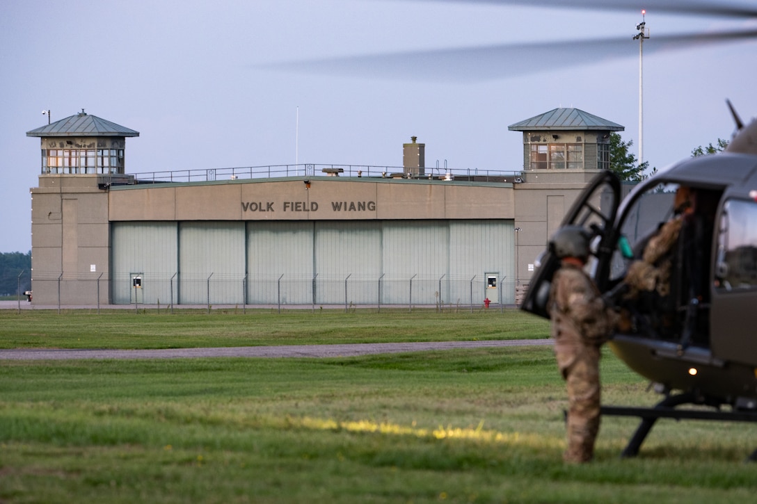 U.S. Army Soldiers from the Kentucky Army National Guard’s 376th Aviation Regiment prepare for a night sortie at Volk Field Combat Readiness Training Center, Wis., Aug. 22, 2026, during exercise Patriot 26. The Air National Guard-hosted exercise brings together approximately 1,000 Airmen and Soldiers from National Guard units across 35 states, along with federal, state and local agencies, to enhance domestic response readiness and interagency coordination during large-scale emergencies. (U.S. Air National Guard photo by Senior Airman Angelee Barnett)