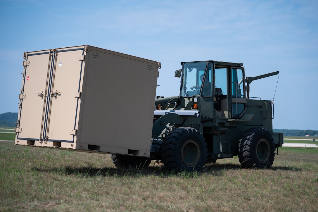 U.S. Air Force Senior Airman Everett Hanley, an air transportation specialist with the Kentucky Air National Guard’s 123rd Contingency Response Group, operates a forklift during exercise Patriot 2026 at Volk Field Combat Readiness Training Center, Wis., Aug. 20, 2026. Patriot 26, an Air National Guard-hosted exercise brings together approximately 1,000 Airmen and Soldiers from National Guard units across 35 states, along with federal, state and local agencies, to enhance domestic response readiness and interagency coordination during large-scale emergencies. (U.S. Air National Guard photo by Senior Airman Angelee Barnett)
