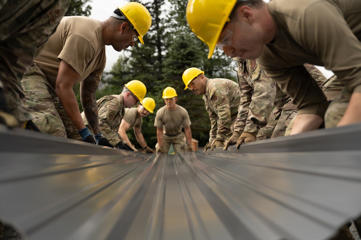 U.S. Air Force Airmen assigned to the 163rd Civil Engineer Squadron, California Air National Guard, renovate lodging facilities during a deployment for training at Seward Military Resort in Seward, Alaska, Aug. 12, 2026. The real-world construction effort allowed 39 engineers spanning seven career fields to enhance structural tradecraft for deployed expeditionary environments. (U.S. Air National Guard photo by Tech. Sgt. Joseph Pagan)