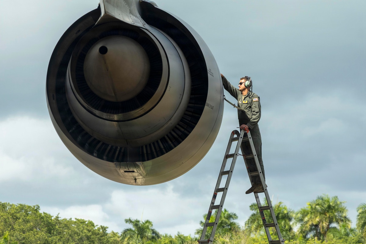 An Airman tests aviation fuel sampled from a C-5M Super Galaxy at José Aponte de la Torre Airport in Ceiba, Puerto Rico, Aug. 22, 2026. Deployed forces supporting Joint Task Force Western Hemisphere maintain agile logistics to counter illicit trafficking and bolster maritime security across the U.S. Southern Command area of responsibility. (U.S. Marine Corps photo by Gunnery Sgt. Kevin Rivas)