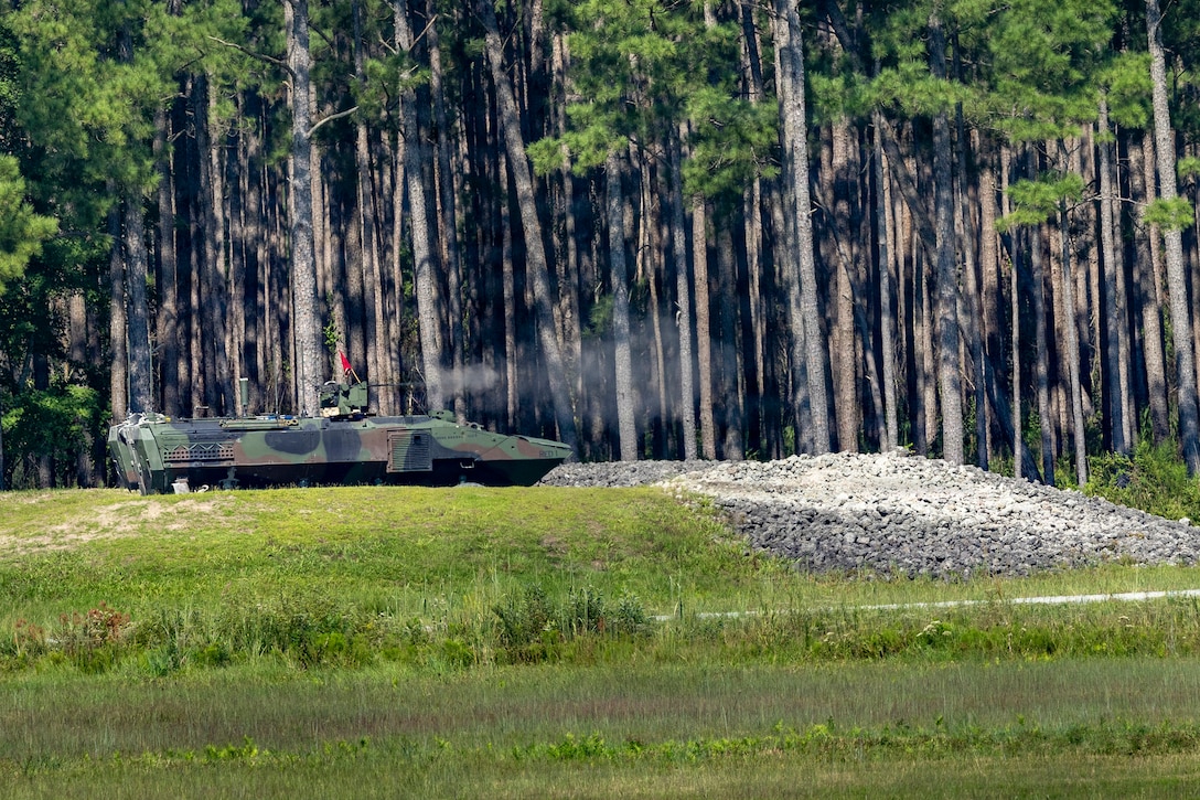 A U.S. Marine Corps amphibious combat vehicle assigned to the Battalion Landing Team 1st Battalion, 8th Marines, 6th Marine Regiment fires its remote-controlled weapon station .50 caliber machine gun during a mechanized infantry live fire range on Camp Lejeune, North Carolina, Sept. 2, 2026. U.S. Marines assigned to BLT 1/8 conducted the range to ensure they remain a highly lethal and adaptable force in preparation for the 26th Marine Expeditionary Unit’s upcoming deployment. (U.S. Marine Corps photo by Cpl. Matthew Williams)