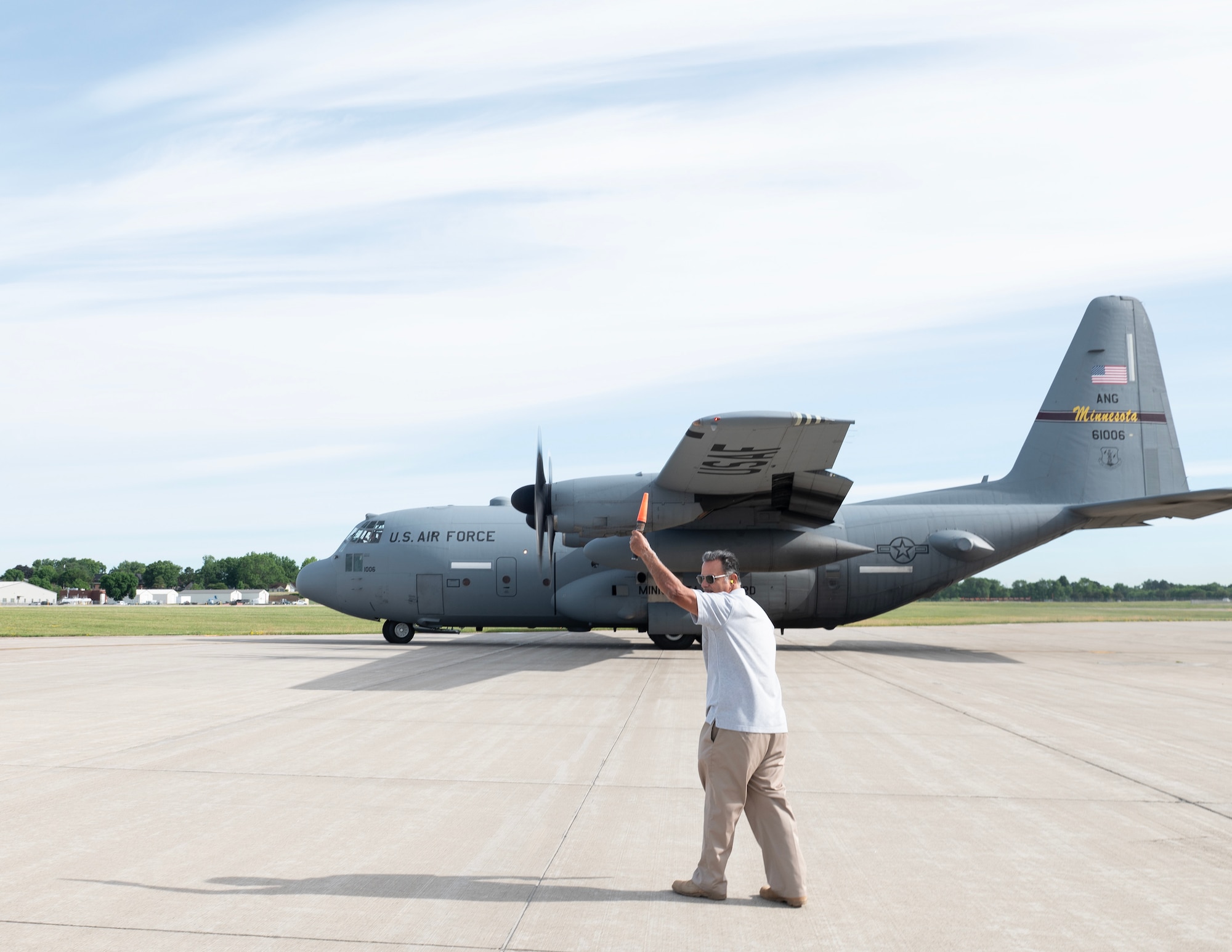 Gary Rodriguez marshals a C-130H3 Hercules off the flightline in St. Paul, Minn., June 15, 2026.