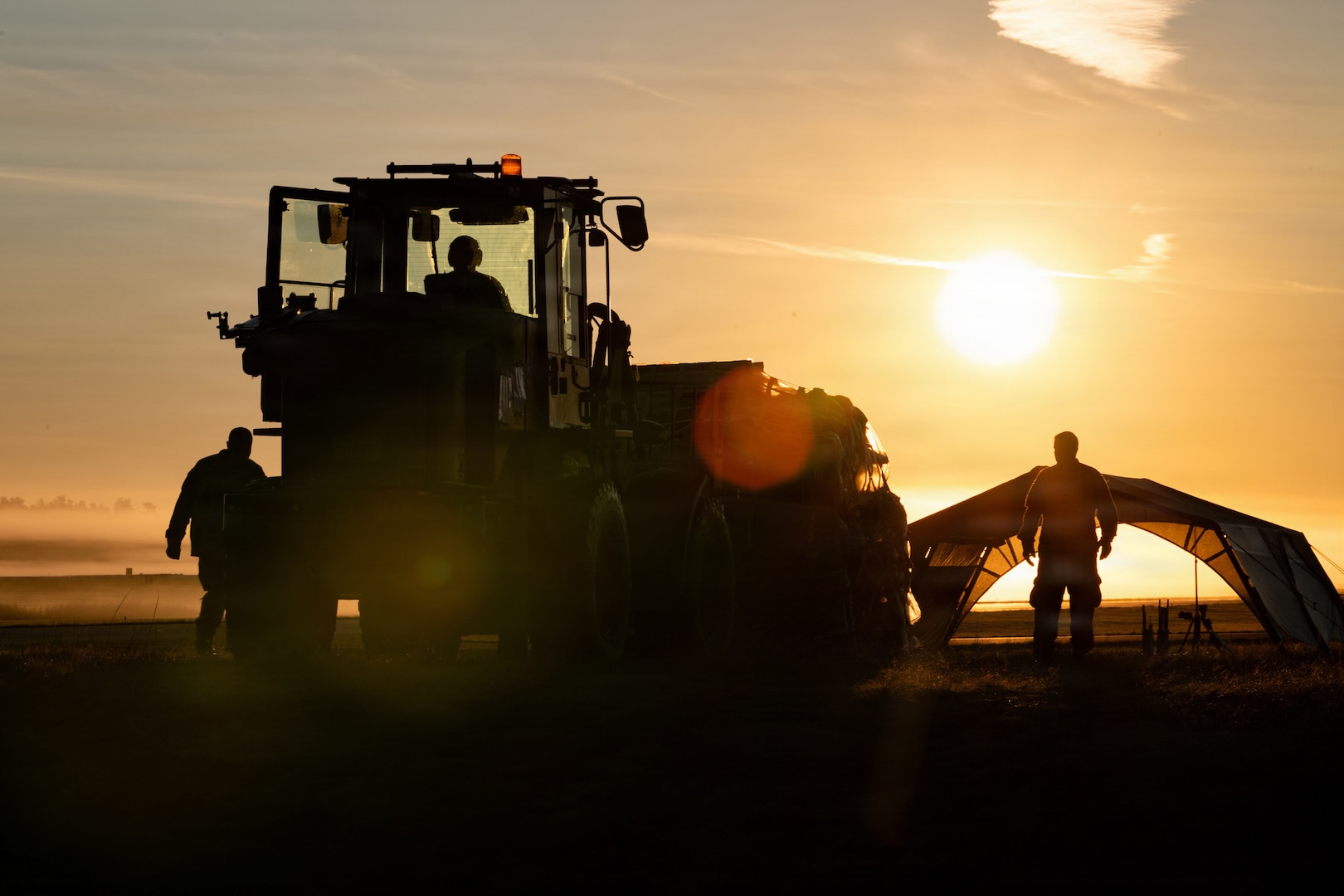 U.S. Air Force Airmen from the Kentucky Air National Guard’s 123rd Contingency Response Group maneuver cargo on a forklift at Volk Field Combat Readiness Training Center, Wis., Aug. 24, 2026, during Exercise Patriot 26.