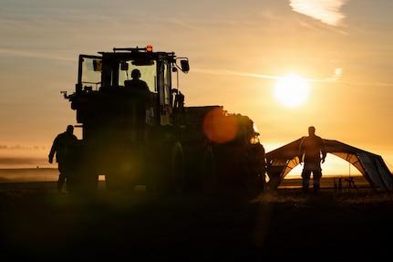 U.S. Air Force Airmen from the Kentucky Air National Guard’s 123rd Contingency Response Group maneuver cargo on a forklift at Volk Field Combat Readiness Training Center, Wis., Aug. 24, 2026, during Exercise Patriot 26.