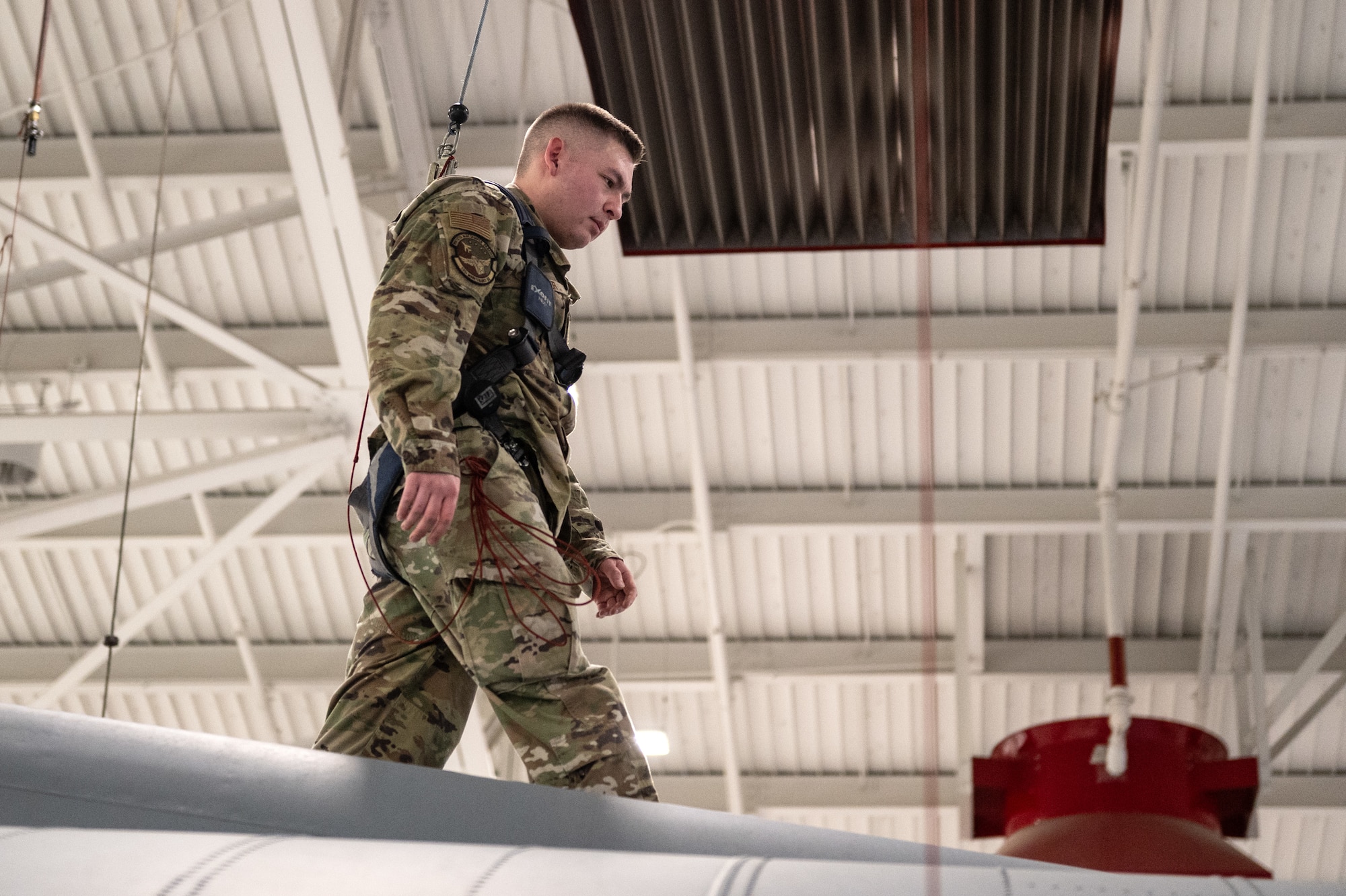U.S. Air Force Tech. Sgt. Collin Crocker, 133rd Maintenance Squadron, completes the placement of the Emergency Transmitter Locator System from a C-130 Hercules in St. Paul, Minn., April 11, 2026.