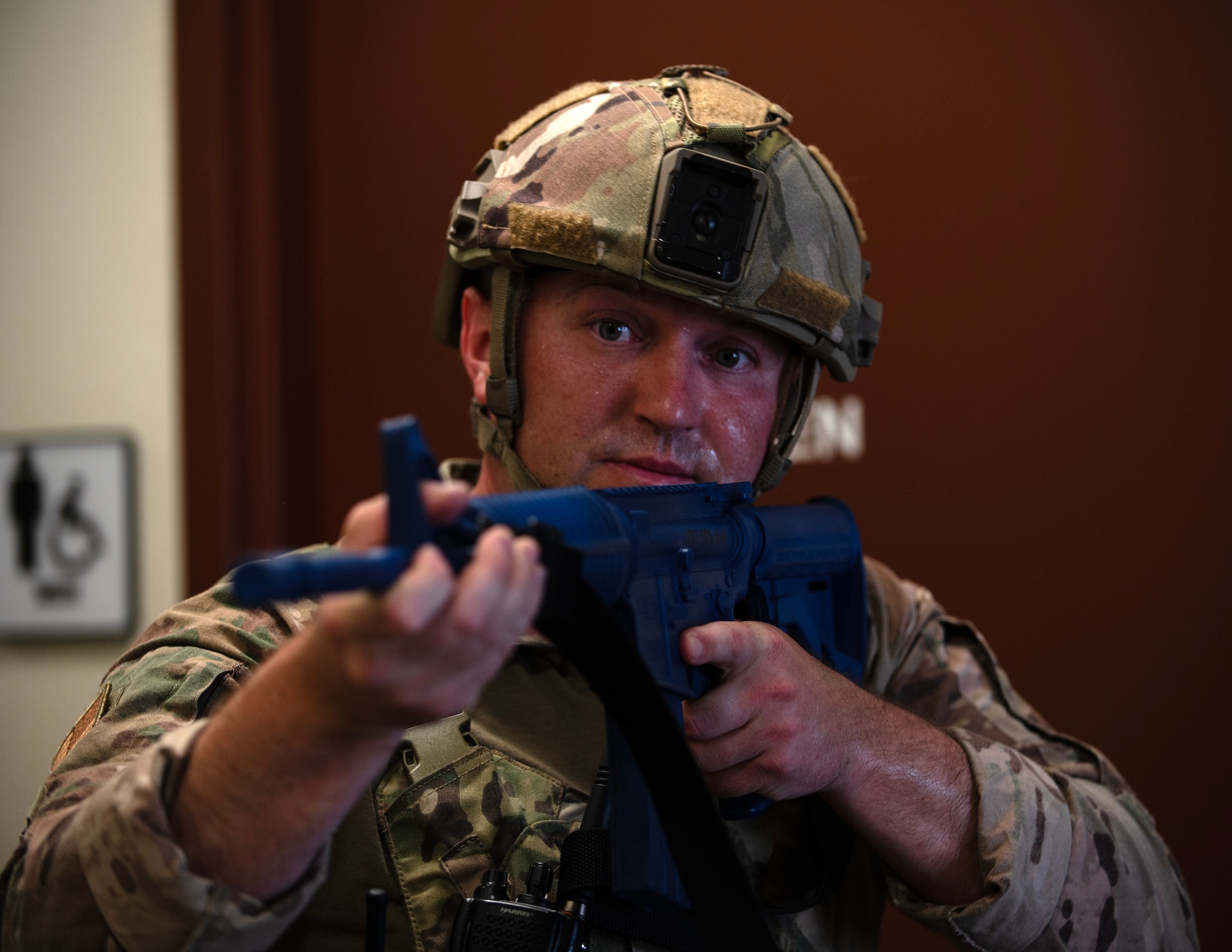 U.S. Air Force Tech. Sgt. Andrey Shimko, 133rd Security Forces Squadron, searches and secures a building in St. Paul, Minn., July 20, 2026.