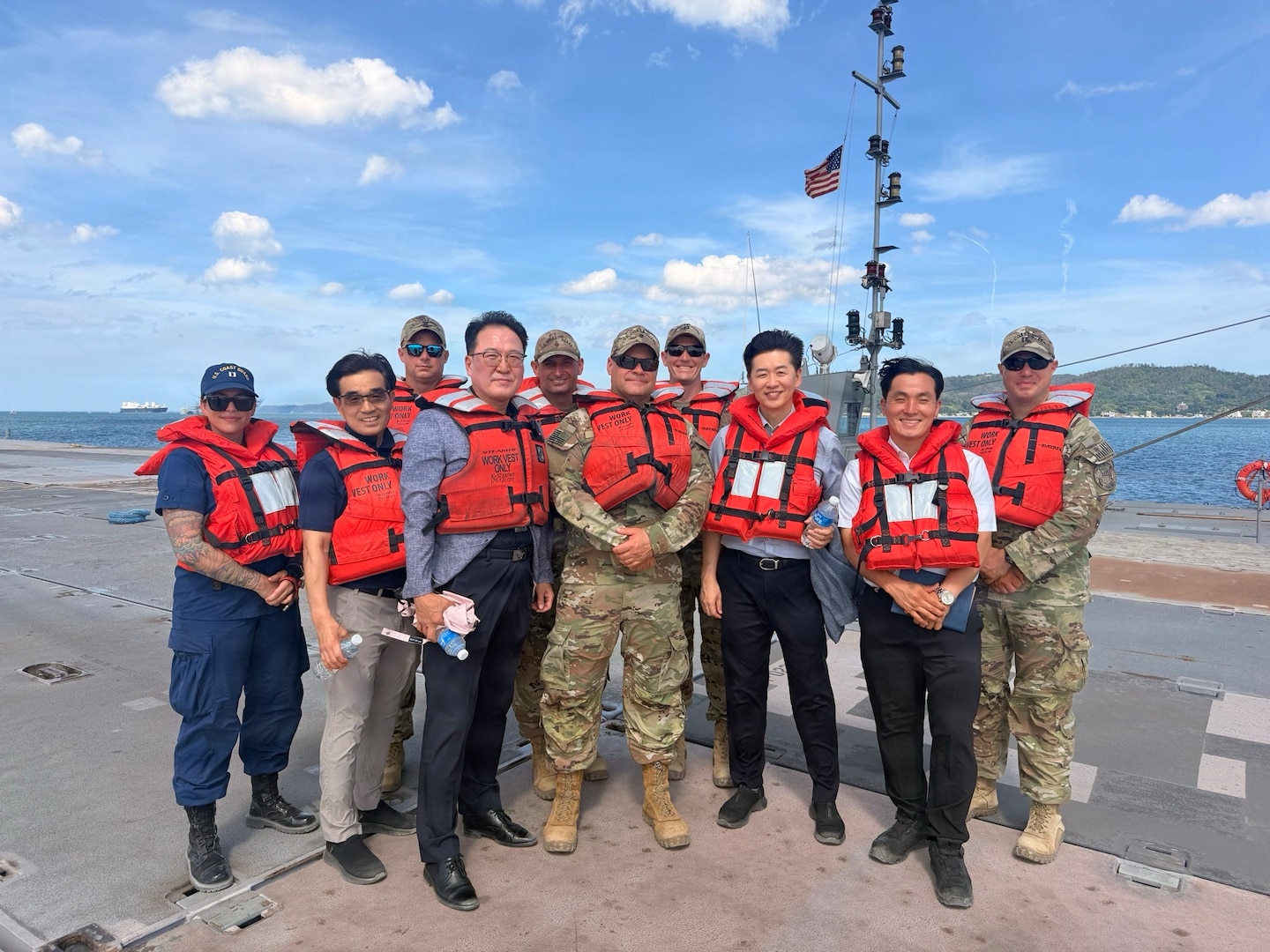 Members of the U.S. Coast Guard and Korea Coast Guard pose for a photo at Yeongil Bay in Pohang, South Korea, during Combined Joint Logistics Over-the-Shore (CJLOTS) 26, July 14, 2026. Conducted in the spirit of the 1953 ROK-U.S. Mutual Defense Treaty, CJLOTS 26 reinforces the Alliance's role as the foundation for regional peace and security. (U.S. Coast Guard photo by Lt. Ashlee Stephens)
