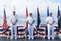 From left to right, U.S. Navy Rear Adm. Peter D. Small, the acting commander for Naval Sea Systems Command, Capt. Joseph J. Oravec, the outgoing commanding officer for Naval Surface Warfare Center Dahlgren Division and Capt. Jason A. Flanagan, the incoming commanding officer, bow their heads during a change of command ceremony at NSWCDD, Dahlgren, Virginia, Sept. 3, 2026. The change of command ceremony is a time-honored tradition which formally signifies the transfer of command and entails total accountability, authority and responsibility from one individual to another. (NSWCDD photo by Jackson Rush)