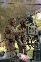 U.S. Soldiers assigned to the 173rd Mobile Brigade Combat Team make sighting adjustments on an M777A2 155 mm howitzer during exercise Saber Junction 26 at the Joint Multinational Readiness Center’s Hohenfels Training Area, Germany, Aug. 30, 2026. The Continuous Transformation initiative is grounded in one principle: increasing the lethality of U.S. Army formations by creating more agile and mobile units capable of responding to complex combat scenarios. (U.S. Army photo by Spc. Aubrey Boyle)