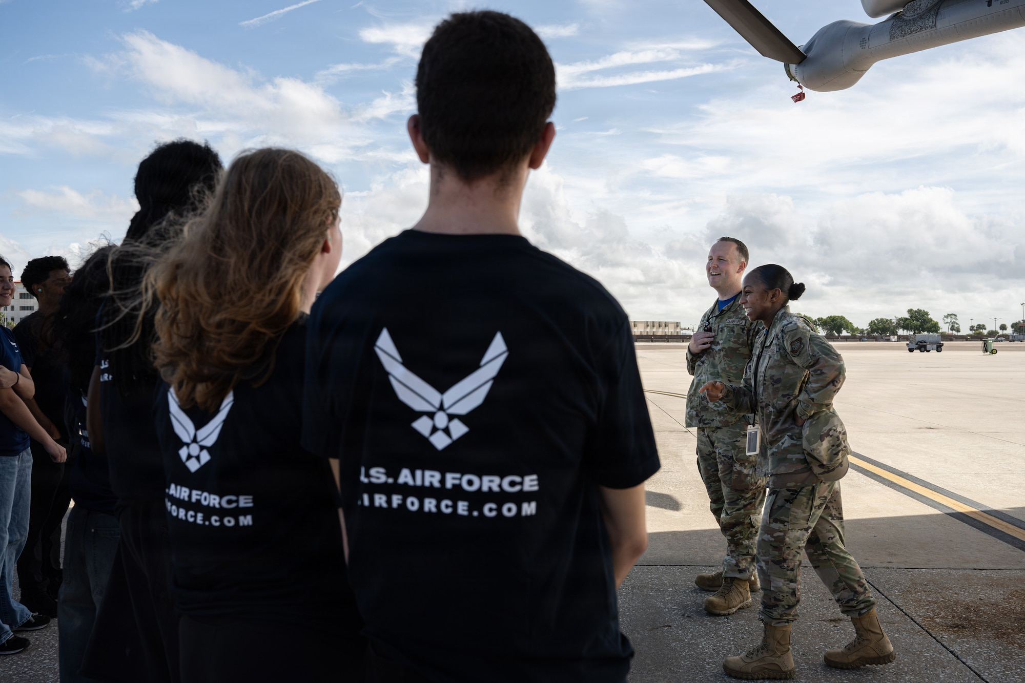 U.S. Air Force Master Sgt. Trenton Scalf, 6th Aircraft Maintenance Squadron crew chief section lead, briefs delayed entry program recruits about the refuel aircraft maintenance career field at MacDill Air Force Base, Florida, Aug. 7, 2026. Crew chiefs do everything from removing and installing engine components, to identifying corrosion for prevention and repair that ensures safe and full operational capacity of the aircraft. (U.S. Air Force photo by Airman 1st Class Helen Ly)